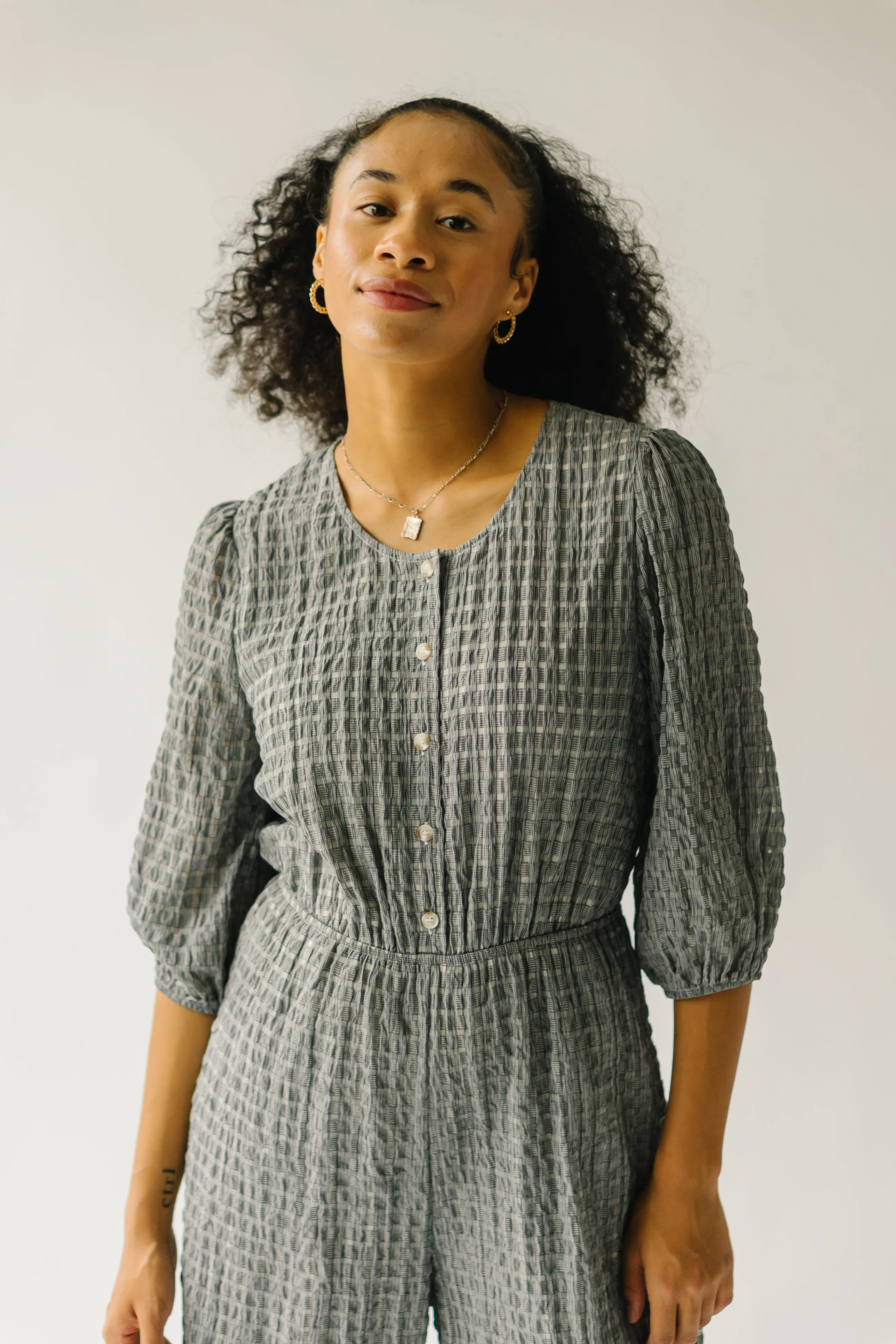 The Prowell Gingham Woven Jumpsuit in Black Multi