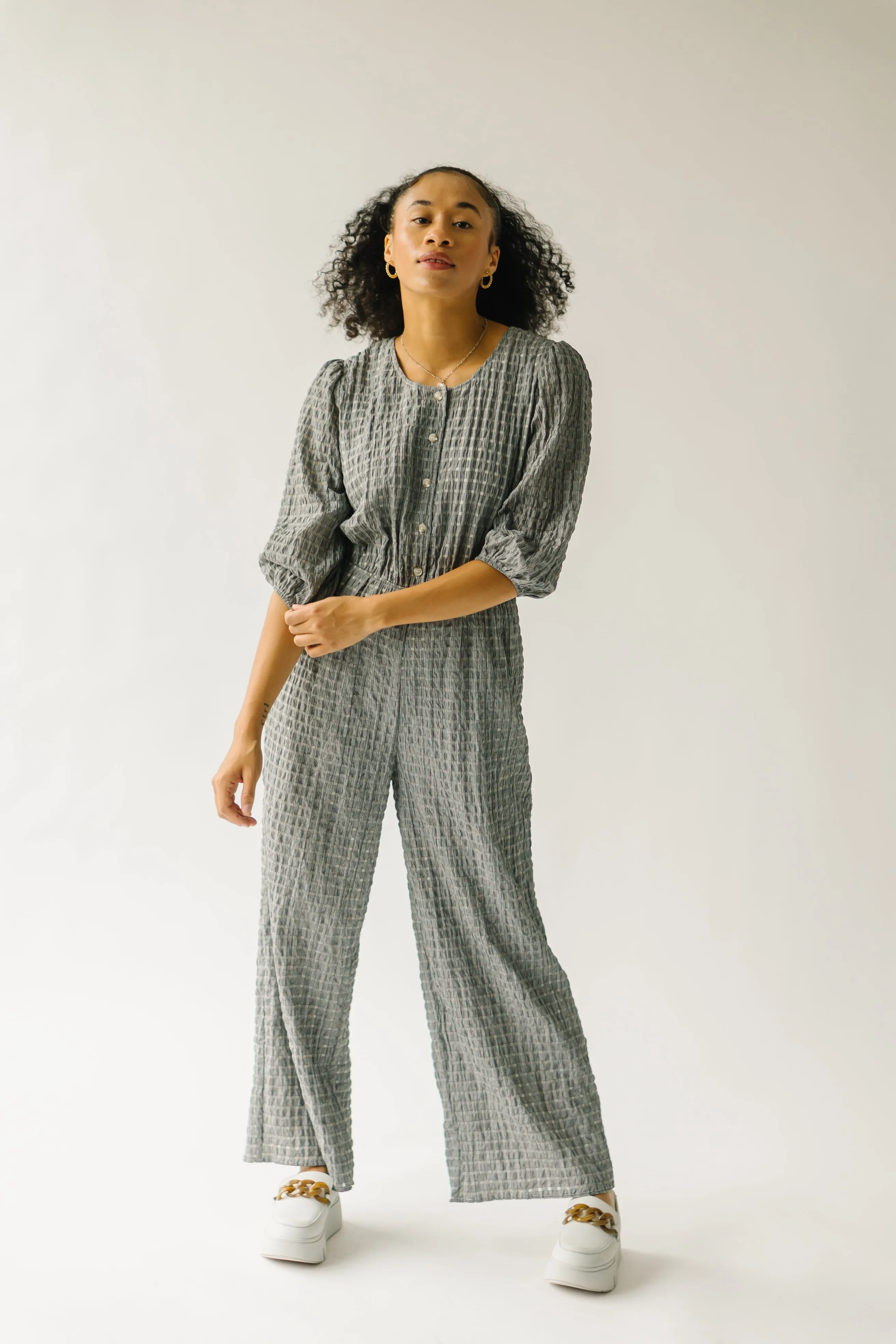 The Prowell Gingham Woven Jumpsuit in Black Multi