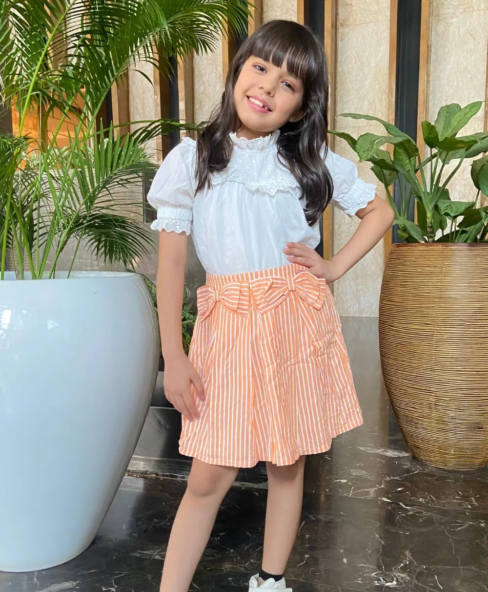 White Ruffled Blouse & Striped Peach Skirt